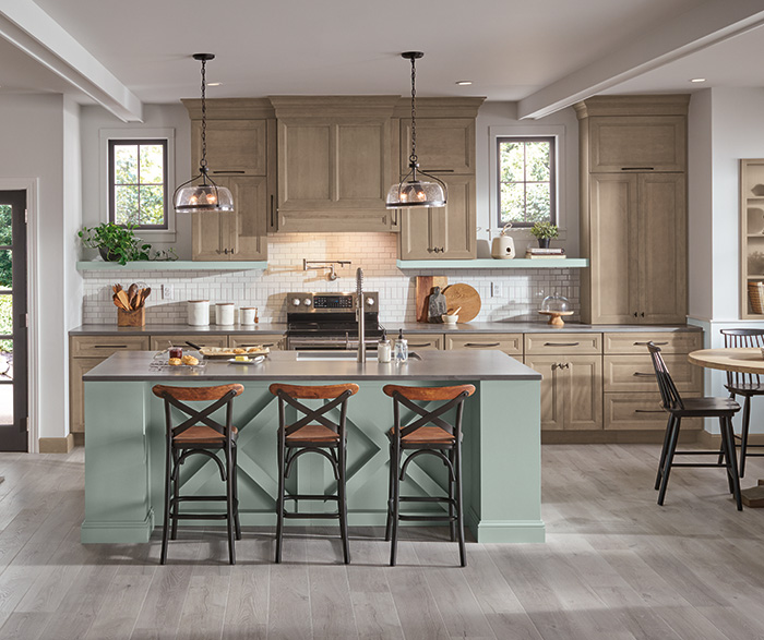 On Trend Kitchen with Blue Green Island Cabinets