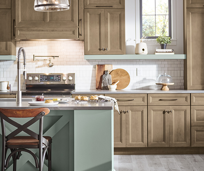On-Trend Kitchen with Blue-Green Island Cabinets